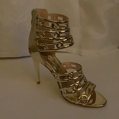 New With Box, Never Worn Gold Heels, Approximately 4 Inches High. Very Nice Shoes, The Only Issue Is The Spilled Glue Made From Factory Which Is Not Noticeable. Gold Heels With 4-inch Heel For Event, Gold Open Heel Heels For Events, Gold High Heels For Events, Chic Gold Heels For Events, Ivory Heels, Hot Pink Heels, Manolo Blahnik Hangisi, Brown Leather Shoes, Studded Heels