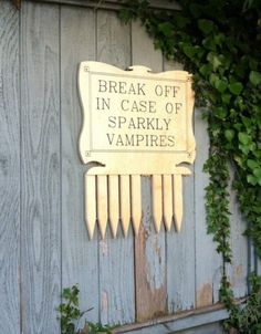 a wooden sign that says break off in case of sparkly vampires