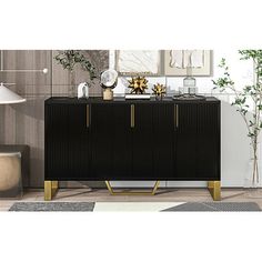 a black and gold sideboard in a living room