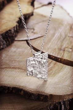 Are you looking for your other half? Look no further! A shiny rectangle cut in half. Unique worn alone, amazing worn with the other half! The choice is yours! https://www.etsy.com/listing/614681111/edgy-rectangle-pendant-small-reticulated?ref=shop_home_active_19 https://www.etsy.com/listing/614673859/black-silver-rectangle-pendant-small?ref=shop_home_active_22 PRODUCT DETAILS The pendant is 3.5cm x 2.4 (approx. 1.37in x 0.95in). Its surface has been specially treated to have a reticulated look. Unique Rectangular Sterling Silver Necklace, Unique Sterling Silver Rectangular Necklace, Silver Hammered Rectangular Pendant Jewelry, Unique Silver Rectangular Necklace, Hammered Sterling Silver Rectangular Pendant Jewelry, Sterling Silver Hammered Rectangular Pendant Jewelry, Silver Sterling Silver Necklace With Rectangular Stone, Hammered Sterling Silver Jewelry With Rectangular Pendant, Hammered Silver Rectangular Jewelry