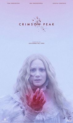 the poster for crimson peak shows a woman with her hands on her chest