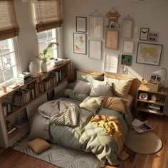 an unmade bed with lots of pillows and blankets on it in front of a window