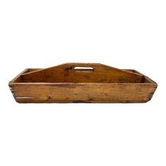 an old wooden tray with handles on white background