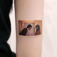 a woman's arm with a painting on it