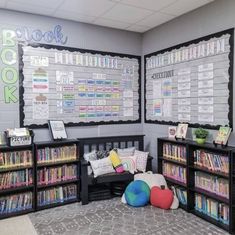 a room with bookshelves and stuffed animals on the floor