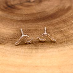 A minimalist take on a beautiful ocean wave. Pure 925 sterling silver of the highest quality. Seashell Art Diy, Wave Earrings, Wave Jewelry, Minimalistic Jewelry, Wave Ring, Seashell Art, Circle Studs, Earrings Simple, Beautiful Ocean