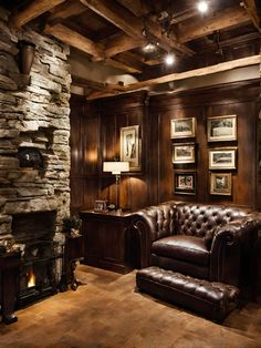 a living room filled with furniture and a fire place in the middle of it's wood paneled walls