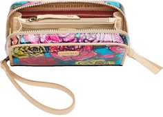 This accessory is functional for everyday use on its own or great for organization inside a larger bag. The Wristlet Wallet expands when unzipped to allow ample space for card organization and can be held by the included wristlet strap. -Multicolor Rosita ConsuelaCloth™ exterior -12 card slots, gusseted compartments, zipper pocket, and 2 open pocket compartments -Natural leather trim -8" (W) x 4 ½” (H) x 1 ¾” (D) 5 ½” drop -Made in Mexico Card Organization, Card Organizer, Baby Easter, Wristlet Wallet, Large Bag, Baby Romper, New Friends, Natural Leather, Leather Trim