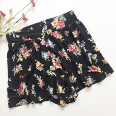 Asos Brand Shorts! Style Is Jersey Culotte Shorts. When You Have Them On, It Almost Looks Like A Mini Skirt- So Cute! Size 2 Usa, 6 Uk, 34 Eur. Jersey Material (Material Tag Is Too Faded To Tell Fabric Content). Allover Black With Floral Print ( Red Pink Yellow Green Blue Purple ). Good Overall Condition- Minor Wear/Pilling. 12 1/4" Long, Inseam 2 1/2", Waist Laying Flat 12". High Waist Style! Looks Great Paired With This J. Crew Yellow Nwt Tee That's Also For Sale In My Closet! Culotte Shorts, Green Blue Purple, Shorts Style, Black Floral Print, Style Looks, Pink Yellow, Blue Purple, Black Floral, Looks Great