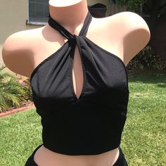 Brand New, Never Worn. Black Halter Crop. Long Halter Ties With Hook Closure Back. Trendy Black Halter Neck Tops, Casual Halter Crop Top For Night Out, Casual Crop Top Halter For Night Out, Black Stretch Halter Neck Top, Solid Color Crop Top Halter For Night Out, Trendy Halter Neck Top For Night Out, Casual Black Cropped Halter Top, Fitted Halter Top For Day Out, Solid Halter Neck Top For Night Out