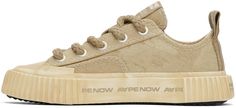 Low-top canvas sneakers in beige. · Graphics coated throughout · Rubber cap toe · Lace-up closure · Logo patch at tongue · Logo flag at outer side · Logo-bonded pull-loop at heel collar · Canvas lining · Logo printed at textured rubber midsole · Treaded rubber sole Supplier color: Beige Beige Sneakers With Logo Patch For Streetwear, Beige Low-top Canvas Sneakers, Cream Canvas Shoes With Vulcanized Sole For Streetwear, Beige Canvas Sneakers For Streetwear, Khaki Low-top Sneakers With Vulcanized Sole, Khaki Sneakers For Streetwear With Vulcanized Sole, Khaki Sneakers With Vulcanized Sole For Streetwear, Beige Cotton Canvas Shoes With Vulcanized Sole, Beige Canvas Shoes With Rubber Sole For Streetwear