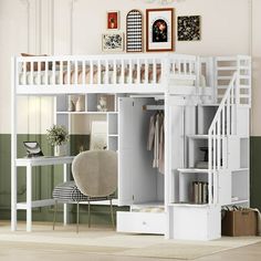 a white loft bed with stairs and desk underneath