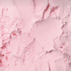 a close up view of pink ice cream