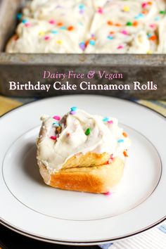 a birthday cake cinnamon roll on a plate