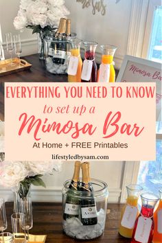 a table topped with bottles and glasses filled with drinks next to a sign that says everything you need to know to set up a minnesota bar at home + free printables