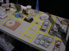 the table is covered with money and other items