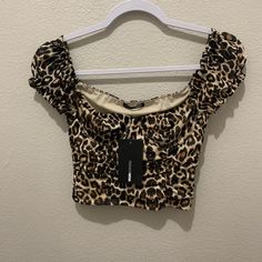 Animal Print Blouse. New With Tag. Size S Fitted Brown Blouse For Summer, Fitted Brown Blouse For Night Out, Summer Fitted Leopard Print Blouse, Fitted Leopard Print Summer Blouse, Fitted Leopard Print Blouse For Summer, Casual Brown Crop Top For Party, Brown Short Sleeve Party Top, Party Brown Short Sleeve Tops, Fashion Nova Shirts