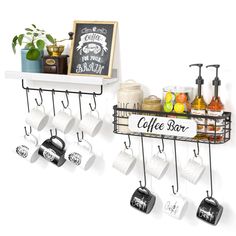 coffee mugs and cups hanging from hooks on a wall next to a sign that says coffee bar