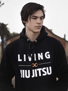 Elevate your everyday style with the Living Unisex Jiu Jitsu Hoodie, the epitome of comfort, quality, and unparalleled BJJ spirit. Whether you're unwinding after a gruelling training session or showcasing your passion for BJJ on the go, this versatile hoodie is your perfect companion. Crafted from premium 100% cotton, it promises exceptional softness and breathability, keeping you cozy and comfortable throughout the day. Features: Premium Quality: Experience the difference with our top-notch cra Kimono Jiu Jitsu, Jiu Jitsu Shirt Ideas, Jiu Jitsu Tshirt, Brazillian Jiujitsu, Bjj Rash Guard, Practical Bag, Eco Friendly Bags, Brand Tags, Lifestyle Clothing