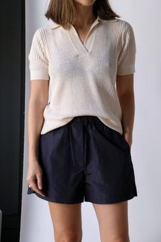 Sale items are final sale. No returns or exchanges. Crafted from luxurious Italian linen and cotton yarn, our Closed Polo Knit Shirt boasts a 12 gauge knit with varying textures for a sophisticated melange look. The relaxed fit, polo collar, V-neckline, and cuffed sleeves and hem make for a versatile and comfortable addition to any wardrobe. Need further assistance? Text our stylists for more details about fit, fabrication, photos etc! 73% linen, 27% cotton Machine wash in wool program or hand w Wool Polo Shirt, Polo Blouse, Raquel Allegra, Pleats Please Issey Miyake, Polo Collar, Dress Jewelry, Knit Shirt, Cuff Sleeves, Sale Design