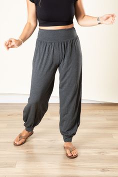 Lounge or practice your asanas in exotic style with our Jum Jum jersey harem pants. After seeing stylish women rocking these fabulous harem pants literally everywhere we travel, once the Mexicali crew tried them on, we understood why! So soft and flowy, these gorgeous hippie pants are ready to rock any adventure you can come up with. They make an awesome pair of stretchy yoga pants, funky high waisted festival pants, or the ultimate cozy travel pants. The elastic-hemmed legs can be worn low on t Cozy Travel, Festival Pants, Hippie Pants, Exotic Fashion, Travel Pants, Purple Teal, Black Charcoal, Orange And Purple, Stylish Women