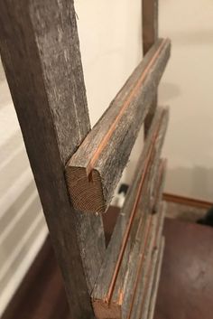 a close up of a piece of wood that has been made to look like a ladder