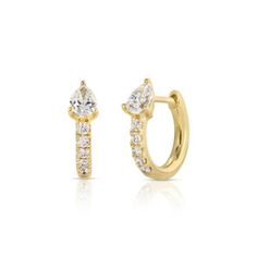 a pair of yellow gold earrings with diamonds