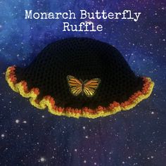 This crochet black, Orange, and Yellow Monarch Butterfly Ruffle bucket hat is part of our ruffle collection and features a cute Ruffle design on the bottom, It also includes a faux Leather name tag and a gem rivet. With a head circumference of 21-23 inches, it is made from black, yellow, and Orange  acrylic yarns for the base and brim, and the ruffles, Whether you're looking to add some flair to your outfit or need a hat for a day at the beach, this is the perfect choice! If you would prefer a different color combination, please feel free to message us. Thank you for visiting our store! Necklace not included just a prop  More colors coming in this design  Come check out my new shop site as well: https://www.Calypsopeacock.com Crochet Ruffle, Monarch Butterfly, New Shop, Acrylic Yarn, Bucket Hat, Faux Leather, Feelings, Hats, Crochet