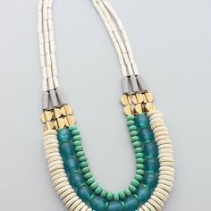 David Aubrey Jewelry’s process of taking the purest artistic elements and molding them into something extraordinary, makes each piece enchantingly one-of-a-kind. Handcrafted in New Jersey. 20" necklace 3" extender Magnesite, turquoise, vinyl, brass, and Ghana glass Made in the USA Designed by David Aubrey Jewelry Artistic Elements, Necklace Ideas, General Store, Glass Necklace, Ghana, New Jersey, Molding, Beaded Jewelry, Choker Necklace