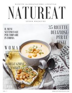 a magazine cover with a bowl of soup and spoons on the table next to it