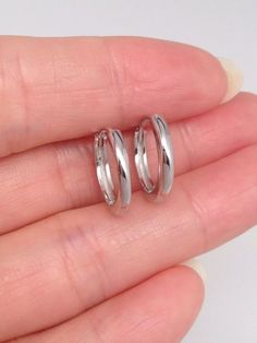 925 Sterling Silver Plain Huggie Hoop Earrings    - Metal: 925 Sterling Silver (Finish: Rhodium Plated) - Shape: Round Huggie Hoop  - Dimension:  Outer Diameter 14mm(0.55 in), Inner Diameter 11mm (0.43 in), Face Width 1.7mm. - Closure: Leverback  - Color: Silver Sterling Silver Mens, Huggie Hoop Earrings, Fine Jewellery Earrings, Earrings Sterling Silver, Jewelry Earrings Hoops, Silver 925, Jewelry Watches, Fine Jewelry, Hoop Earrings