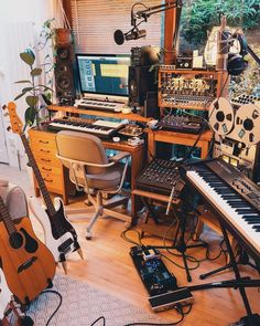 a room filled with musical instruments and sound equipment