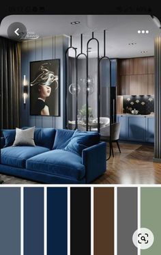 a living room with blue couches and black walls, wooden floors and flooring