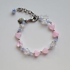 "Handmade Dreamy Pearl Bracelet ✿ Made with glass crystal beads, glass beads, and metal accents ✿ Colors: Silver, petal pink, ice blue, and iridescent clear ✿ The bracelet has an additional 1-1.5\" of extension chain" Pink And Blue Accessories, Pink Crystal Charm Bracelet Gift, Nickel-free Pink Crystal Bracelet As A Gift, Adjustable Nickel-free Pink Crystal Bracelet, Beaded Heart Bracelet, Beading Jewelery, Blue Accessories, Jewelry Diy Bracelets, Star Bracelet