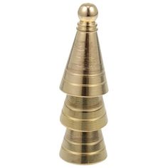 a brass christmas tree shaped candle holder on a white background