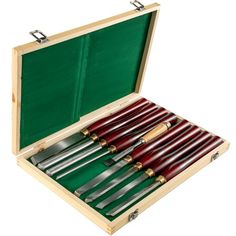 an open box with many knives in it