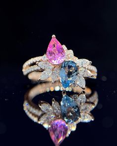 "This ring features a (8x8mm 8x8mm pear cut lab Made Aquamarine and pink sapphire). It is made by hand, and it will take about 6 to 8 days to finish the ring after your payment is completed. Main stone: 8x8mm 8x8mm Cut Type: pear cut Main stone: Lab Aquamarine and pink sapphire  Material: 925 sterling silver/rose gold/white gold/yellow gold Accent stone: american diamond Payment Policy We accept payment through PayPal only. We have selected PayPal because it is the safest and most reliable mode of payment which enables to rapid shipping to our buyers and protects their interests. Feedback Policy Please do not leave the Negative feedback or Natural feedback before giving us a chan to resolve your problems. Positive feedback will be automatic to leave for you when you give me Positive feedba Two Stone Ring, Pink Sapphire Ring, Aquamarine Ring, Wedding Anniversary Gift, Stone Engagement Rings, American Diamond, Anniversary Gift For Her, Ring Engagement, White Rose Gold