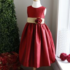 This Red Sleeveless Silk Dress With Gold Sash Is Beautiful! This Gorgeous Dress Is Made Of A Beautiful Scarlett Red Poly Dupioni Silk, (Which Is Sturdier And More Practical Than 100% Dupioni Silk). This Size 5/6 Dress Has A Gold Organdy Sash That Ties Into A Large Billowy Bow In Back. The Dress Is Lined With A Slip And Has A Tier Of Crinoline To Add Just The Right Amount Of Volume. Zippered Back. Shaded Red Silk Flower Adorns The Front Of The Sash Or Can Be Worn In The Back At The Center Of The Red Gold Wedding, Scarlett Red, Gold Sash, Matching Sisters, Gold Bridesmaid Dresses, Dupioni Silk, Dress Gold, Silk Flower, Flower Girl Dress