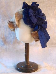 Handmade Dark Blue Bowknot Veil Mini Hat Blue Adjustable Costume Hats With Short Brim, Blue Adjustable Headband Costume Hat, Adjustable Blue Headband Costume Hat, Adjustable Blue Costume Headband, Blue Adjustable Cap-style Costume Hats, Adjustable Blue Cap Costume Hats And Headpieces, Blue Adjustable Headband Fascinator, Adjustable Blue Headband Fascinator, Handmade Adjustable Blue Costume Hats And Headpieces