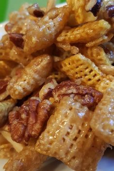 a pile of cheetos sitting on top of a white plate