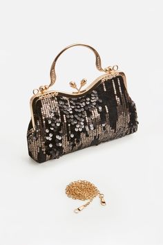 Chic, glamorous and incredibly luxurious, this flapper clutch, with its unique detailing and minimalist design, is a must for any of your big entrances. Features: Glittering sequin decoration Unique kiss lock Detachable chain strap design( Length: 47.2 inch / 120 cm) 8inch / 24.9 cm x 5.3 inch / 13.5 cm ( L x H ) Glamorous Sequin Clutch Bag, Sequin Rectangular Evening Bag For Night Out, Glamorous Rectangular Sequined Evening Bag, Rectangular Sequin Evening Bag For Night Out, Glamorous Sequined Evening Bag For Party Season, Glamorous Sequin Bag For Night Out, Glamorous Sequin Party Bags, Rectangular Sequined Party Clutch, Chic Sequined Clutch Bag