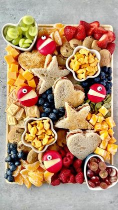 an image of a tray full of fruit and crackers on instagram for valentine's day