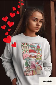 This Retro Christmas Collage Sweatshirt brings a nostalgic and festive vibe, perfect for the holiday season. Made with a cozy medium-heavy fabric blend, classic fit, and double-needle stitching for durability, this sweatshirt offers a comfortable and stylish wearing experience. It is ideal for those looking for a cozy and festive option for Christmas and winter celebrations. Product Features - Retro Christmas Collage design - Sizes Small-3XL - 50% cotton and 50% polyester medium-heavy fabric blend - Classic fit with a crew neckline - Double-needle stitching for durability - Ethically and sustainably made with 100% US cotton Care instructions - Machine wash: cold (max 30C or 90F) - Non-chlorine: bleach as needed - Tumble dry: low heat - Do not iron - Do not dry clean Our one-of-a-kind produ Cute White Christmas Sweater, Cute Christmas Sweatshirt With Graphic Print, Christmas Graphic Print Holiday Sweatshirt, Cute Christmas Graphic Print Sweatshirt, White Christmas Sweater With Graphic Print, White Christmas Graphic Print Sweater, Christmas Graphic Print Sweatshirt, Cozy Christmas Tops With Graphic Print, Cozy Christmas Graphic Print Tops