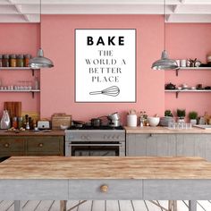 a kitchen with pink walls and wooden counters