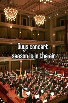 an orchestra with the words guys concert season is in the air