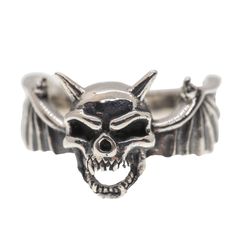 IF YOU REQUIRE A LARGER QUANTITY THAN IS SHOWING PLEASE CONTACT US WE MAY BE ABLE TO ACCOMMODATE YOU *   Vampire Bat Skull with Horns Ring *   Great biker ring,  made from .925 solid sterling silver *   M-Z+5  Sizes Available, If you would like a size outside this range, please contact us *   Postage is included with all items dispatched in the      UK *   If you change your mind for whatever reason we are      happy to accept a return, however, if your reason for      return is through no fault Collectible Gothic Skull Ring, Gothic Jewelry For Biker Events And Halloween, Edgy Silver Rings For Streetwear, Silver Punk Skull Ring For Halloween, Collectible Symbolic Skull Ring For Halloween, Punk Sterling Silver Skull Ring, Sterling Silver Skull Ring In Punk Style, Gothic Skull Ring For Streetwear, Silver Skull Ring For Halloween Streetwear