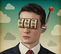 a man in a suit and tie with four cards on his forehead