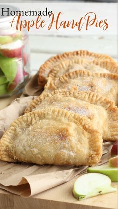 homemade apple hand pies with apples in the background