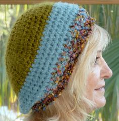 Blue Green Crochet Hat Unique Original Winter by hatsbyanne1942 Green Whimsical Crochet Yarn Hat, Handmade Green Crochet Hat, Casual Style, Blue And Green Crochet, Green Crochet Hat, Whimsical Green Hand Knitted Hats, Hand-knitted Green Crochet Hat, Whimsical Green Hand-knitted Crochet Hat, Crochet Winter Hat, Crochet Character Hats