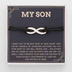 a black cord bracelet that says, my son i want you to believe deep in your heart that you're capable achieving anything